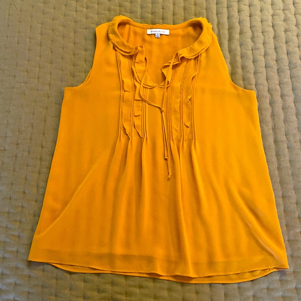 Sleeveless gold top